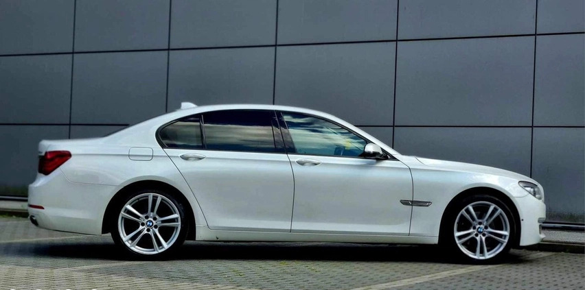 BMW Seria 7 cena 73900 przebieg: 210955, rok produkcji 2014 z Otwock małe 92